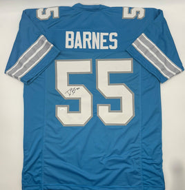 Blue sports jersey with 'Barnes' and number '55' on a white background