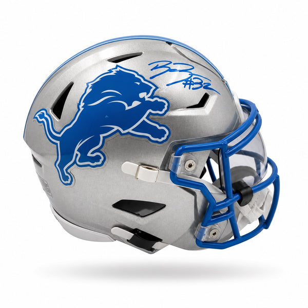 Silver football helmet with blue face mask and logo on a white background