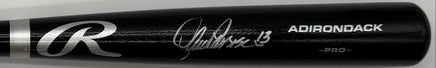 Black baseball bat with a silver logo on a white background