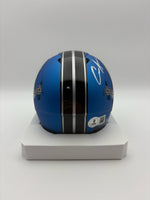 Blue helmet with black stripe on a white background