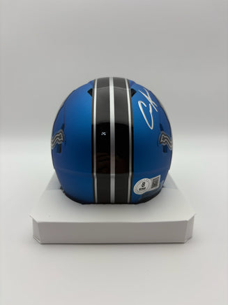 Blue helmet with black stripe on a white background