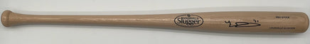 Wooden baseball bat with a brand logo on a white background